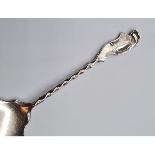 289 - Antique silver spoon in the form of a spade. Having a barley twist handle and scroll work to finial.... 