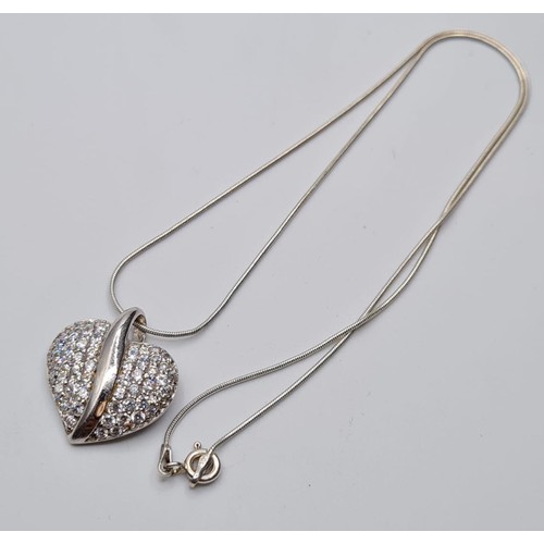 302 - Silver Heart Pendant, Diamante filled ,with a  silver necklace. Both pieces marked 925 Silver. Chain... 