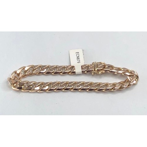 424 - 9k yellow gold chunky curb bracelet, weight 38.4g and over 8