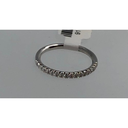 479 - 18k white gold half eternity ring with 0.17ct diamonds, weight 1.92g and size L (ecn705)