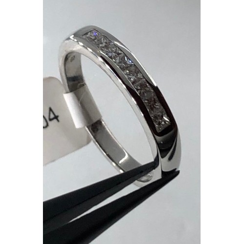 488 - Platinum half eternity ring with 0.60ct diamonds princess cut, weight 5.5g and size H1/2 (ecn699)