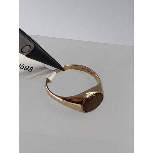 504 - 9k yellow gold ring with tiger eye stone (10x7mm oval) weight 2.7g and size T (ecn598)