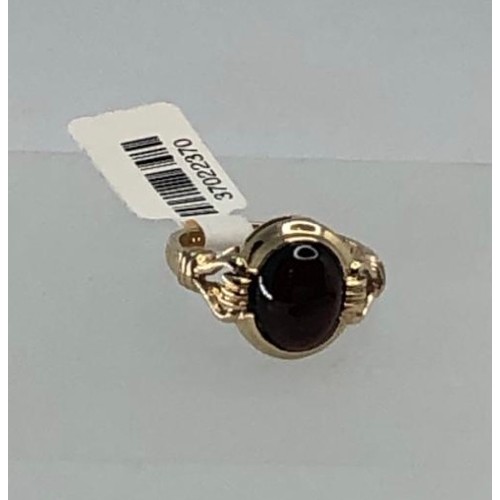 506 - 9k yellow gold ring with garnet cabochon (9x7.5mm) weight 3.2g and size L (ecn590)