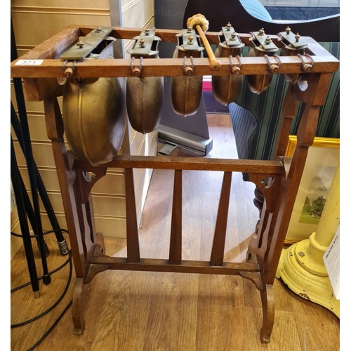 371 - An early 20th century 6 note xylophone in need of restoration. 78cm tall & 55cm wide