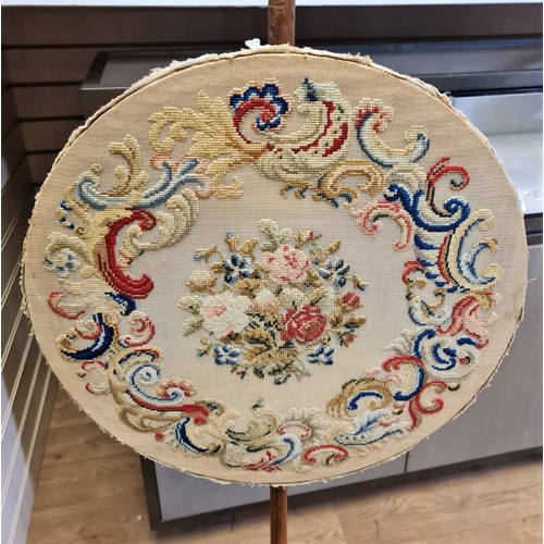 372 - A Victorian 3 legged tapestry holder with circular tapestry. 150cm tall, Tapestry 52cm diameter.