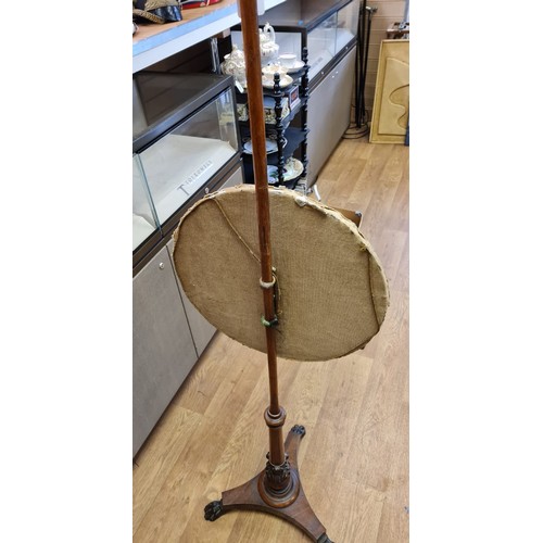 372 - A Victorian 3 legged tapestry holder with circular tapestry. 150cm tall, Tapestry 52cm diameter.