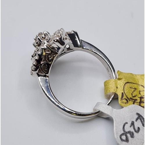 474 - 18CT WHITE GOLD FANCY TWIST FLOWER CLUSTER RING, WEIGHT 7G, 0.90CT. SIZE O