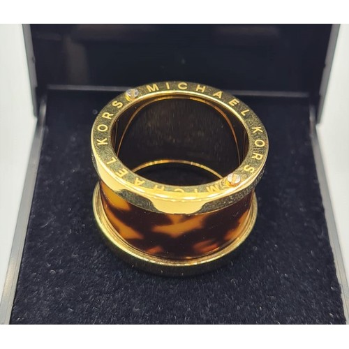 536 - MICHAEL KORS GOLD PLATED TIGERS EYE LOOK AND WHITE STONE RING, SIZE K/L