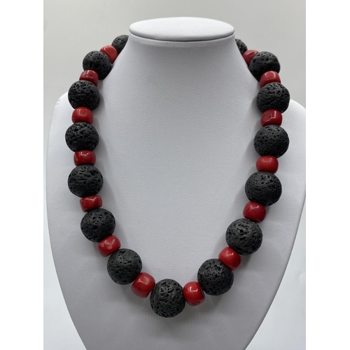 578 - An unusual Hawaiian lava and red coral necklace, bracelet and earrings set (beads 20mm).