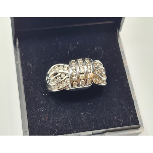 377 - 9CT WHITE GOLD and DIAMOND RING,6.9Grams & 0.6 carats .SIZE N.