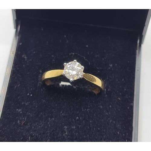 386 - 18CT YELLOW GOLD DIAMOND SOLITAIRE RING 0.60CT APPROX & WEIGHT 3.3G. SIZE M