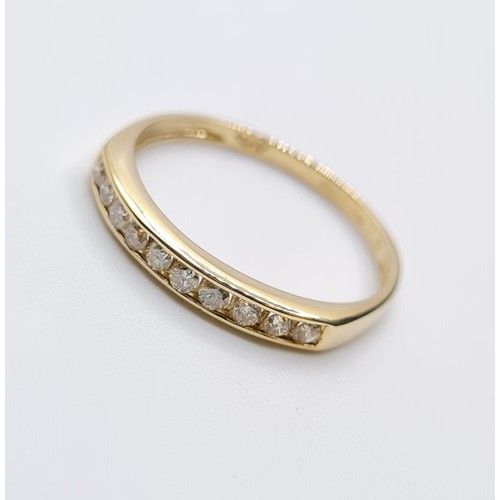 527 - 9CT YELLOW GOLD DIAMOND 1/2 ETERNITY RING, WEIGHT 1.2G & 0.25CT, SIZE P/Q