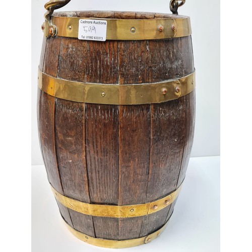 599 - Victorian brass banded copper barrel with handle, 40cm high and 24cm diameter approx