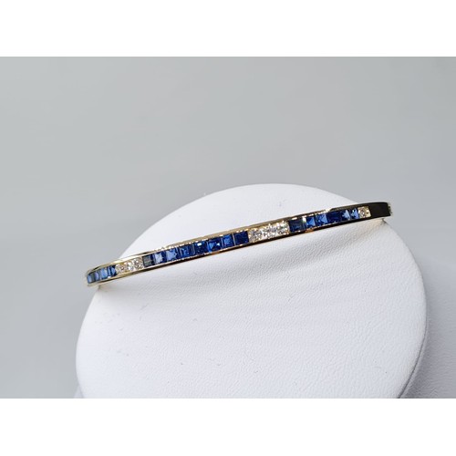 4 - 18CT YELLOW GOLD DIAMOND & SAPPHIRE CHANNEL SET BANGLE, WEIGHT 15G & 0.25CT APPROX