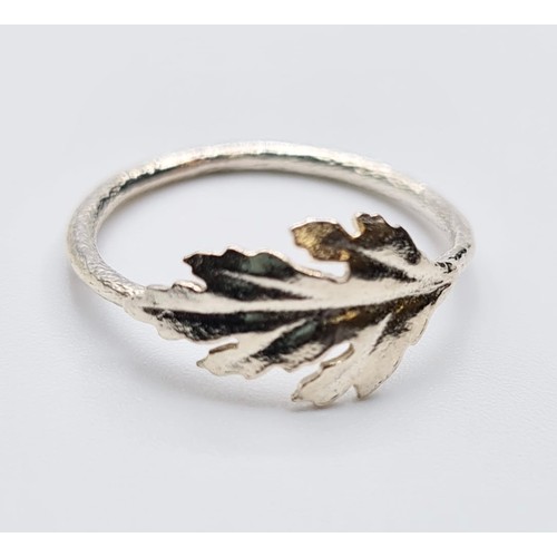 193 - STERLING SILVER LEAF RING. Size I/J