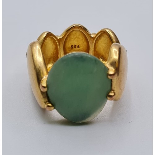 211 - STERLING SILVER WITH GOLD VERMEIL GREEN STONE RING, WEIGHT 13.3G. Size L/M