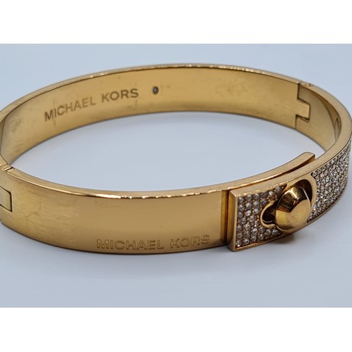 206 - MICHAEL KORS G/P STONE SET BANGLE