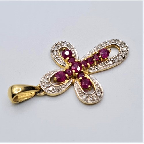 160 - 9CT YELLOW GOLD DIAMOND & RUBY SET CROSS, WEIGHT 2G