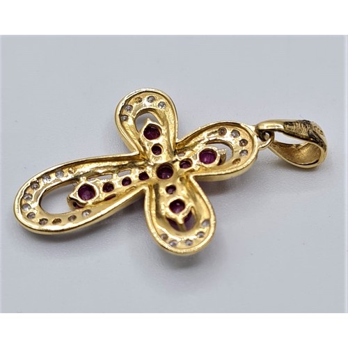 160 - 9CT YELLOW GOLD DIAMOND & RUBY SET CROSS, WEIGHT 2G