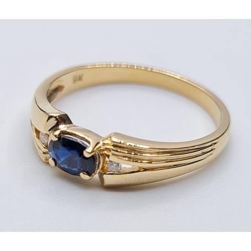 177 - 9CT YELLOW GOLD DIAMOND & SAPPHIRE 3 STONE RING, WEIGHT 1.9G. Size N