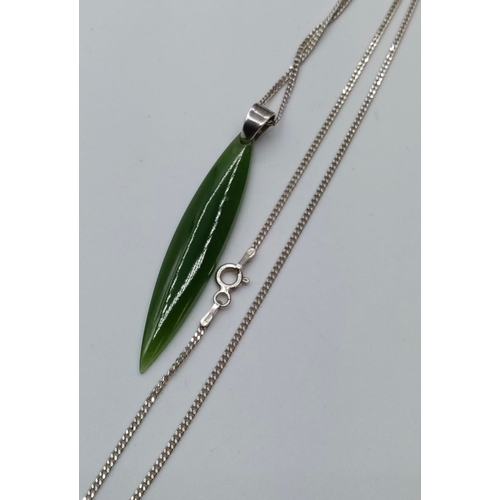 286 - Jade Green Pendant on Silver Chain. Full Silver Hallmarks. Chain 45cm Approx. N.B. Pendant Appears t... 