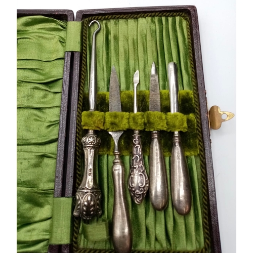 33 - Antique Silver Handled Articles in a Ladies Etui ‘Leather’ Case,to Include a Buttoner and Manicure P... 