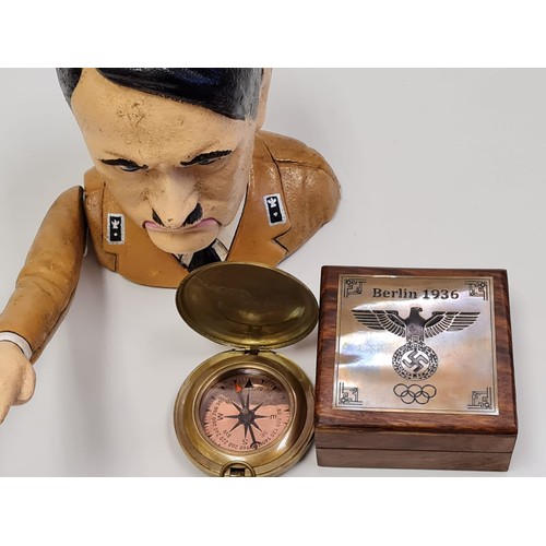 12 - Memorabilia from Berlin 1936 Olympic games 
A cased brass compass with the 