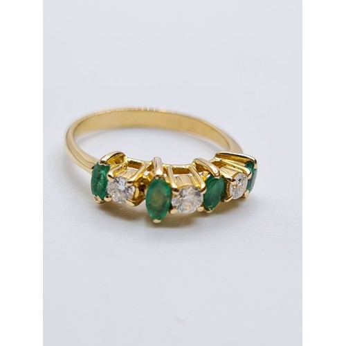 183 - 18CT YELLOW GOLD DIAMOND & EMERALD 7 STONE RING, WEIGHT 2.2G. Size I/J