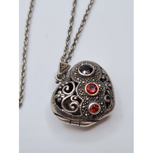 212 - STERLING SILVER GARNET SET VINTAGE LOCKET ON CHAIN