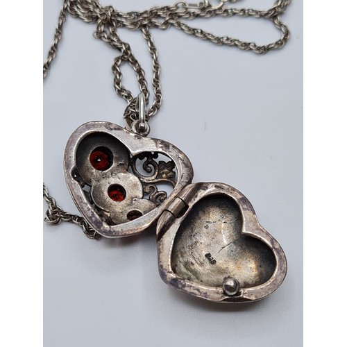 212 - STERLING SILVER GARNET SET VINTAGE LOCKET ON CHAIN