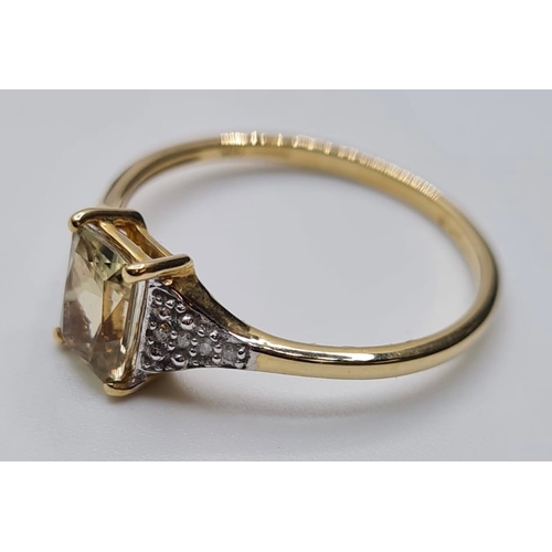 126 - 9ct Yellow Gold Stone Set Ring Having a Centre Topaz and With 4 Delicate Diamonds to Each Shoulder. ... 