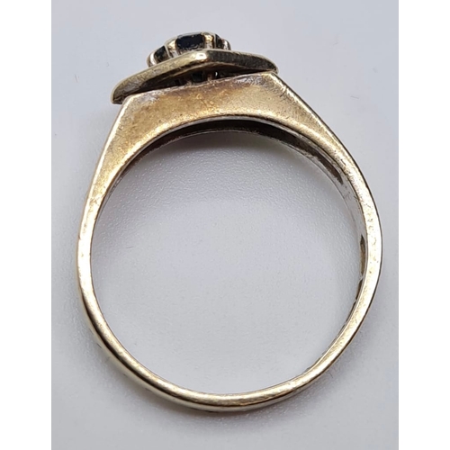 151 - 9ct Gold Ring with a Single Sapphire Mounted in White Gold Setting, Size M, N.B. Band is not Perfect... 