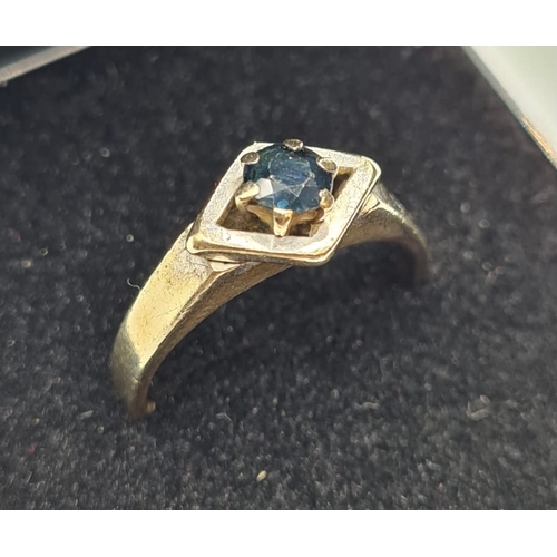 151 - 9ct Gold Ring with a Single Sapphire Mounted in White Gold Setting, Size M, N.B. Band is not Perfect... 