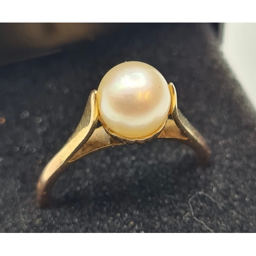 154 - 9ct gold ring, single pearl mounted top with gold downsizers fitted inside band. size M1/2