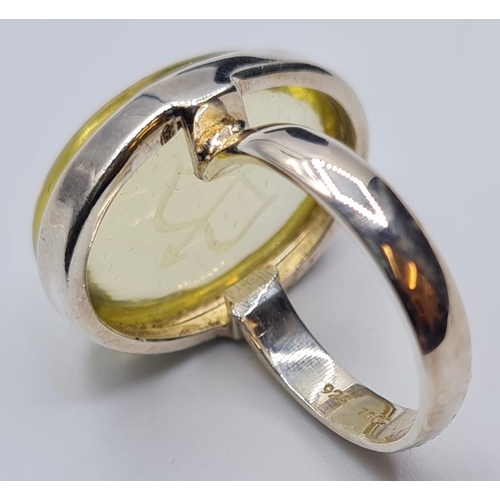 269 - Large Silver Stone Set Ring. Pale Citrine Having a ‘Cupid’s Bow’ Inside the Stone in an ‘Intaglio’ T... 