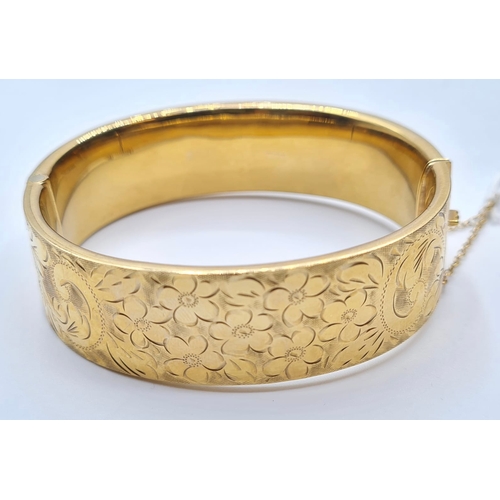 375 - Vintage 9ct Gold Engraved Bangle with Safety Chain, 23.7g.