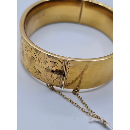 375 - Vintage 9ct Gold Engraved Bangle with Safety Chain, 23.7g.