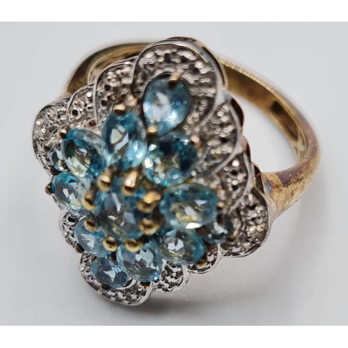 417 - Stone Set Silver Cluster Ring Having Blue Green Topaz Coloured Stones with Silver Beading Border to ... 