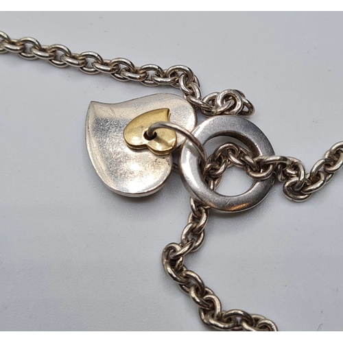 419 - Irish Silver Heart Pendant by Acara. Having a 'T' Bar Fastener and a Silver Chain of 40cm Approx. Ha... 