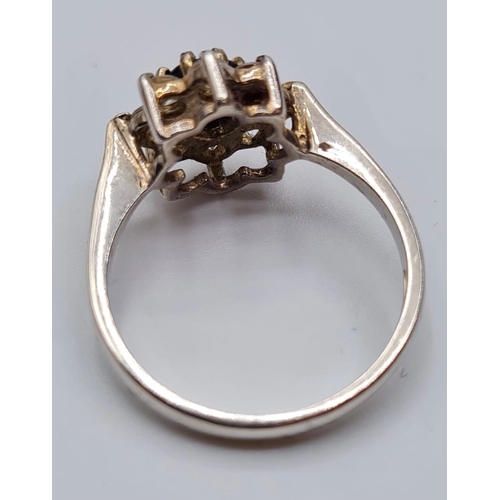 422 - Stone Set Silver Ring Having Centre Sapphire Type Stone with an Eight Point Zirconia cluster Surroun... 