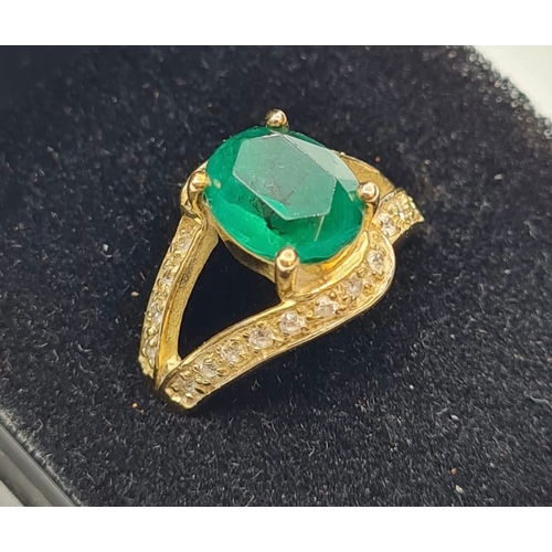 432 - Silver Ring Having Oval Green Stone to Top and Zirconia's Surround on 'V' Shaped Shoulders. Silver h... 