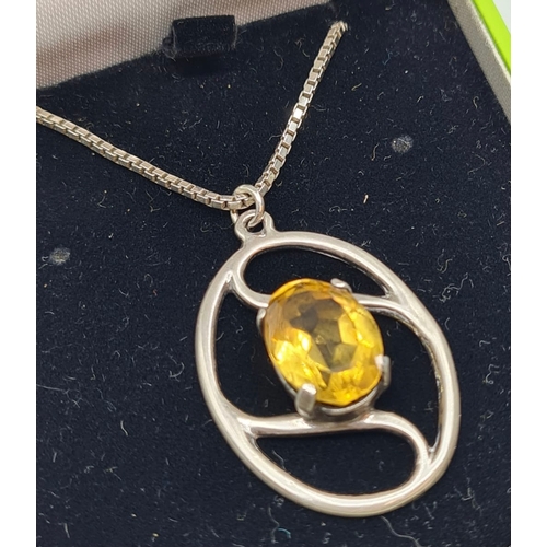 435 - Rennie Mackintosh Designed Silver Pendant on a Silver Box Chain. Large Oval Citrine Centre Stone. Ch... 