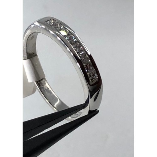 483 - Platinum half eternity ring with 0.40ct diamonds (top quality princess cut) weight 6.60g and size R+... 