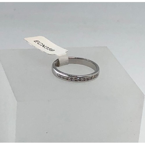 490 - 18k white gold half eternity ring with 0.25ct diamonds, size M and weight 2.86g (ecn359)