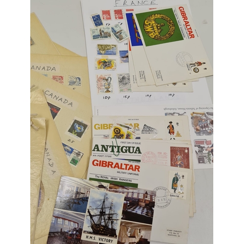 423 - A Stamp Collection to Include 15+ 1st Day Covers and Many Used Stamps.