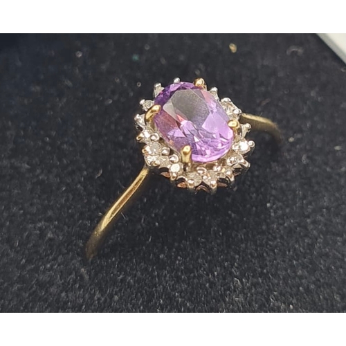 440 - 9ct Gold Amethyst and Diamond Ring. Oval Amethyst to Centre with Diamond Surround, Size P