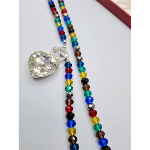 414 - A genuine murano coloured glass necklace with heart shaped pendant in original box