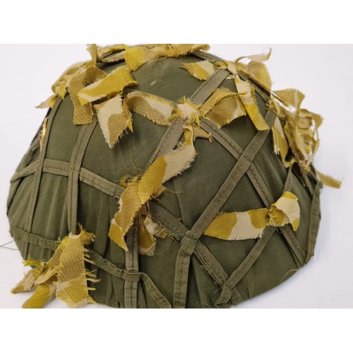 142 - Vietnam War Era Vietcong Fibre Helmet with green rainy season cam cover and beige dry season cam cov... 