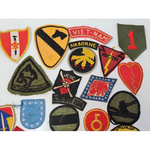 127 - 25 x Vietnam War “In Country” Made US Army Cloth Badges