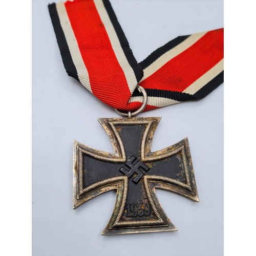 81 - WW2 German Iron Cross 2nd Class EK2. 3 part construction with iron core. In original packet of issue... 